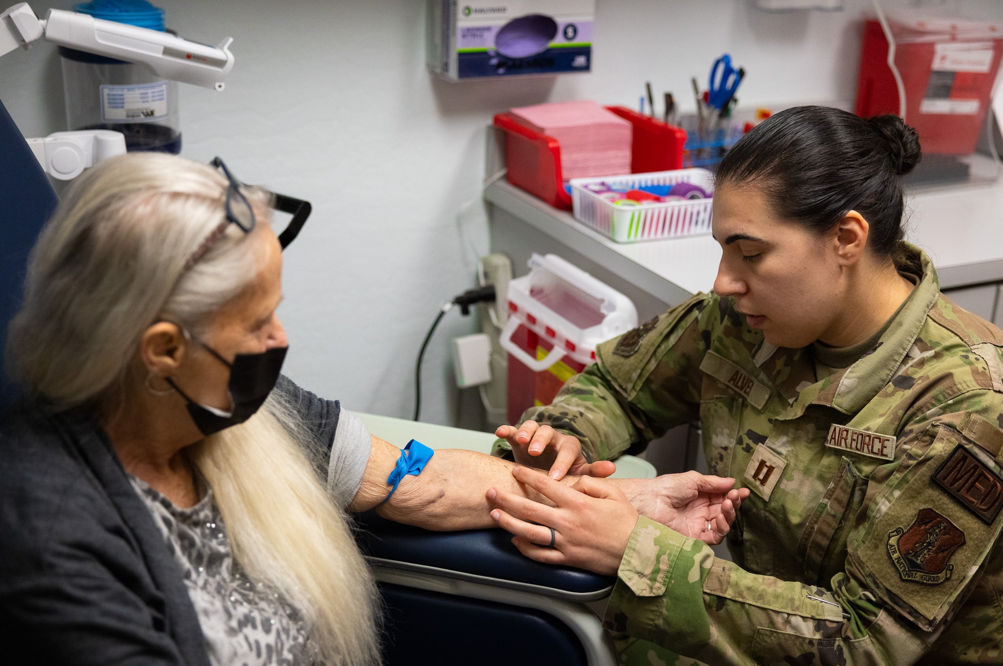 U.S. Air Force Capt. Jessica Alves, a medical specialist assigned to the 109th Airlift Wing, New York Air National Guard, works with a patient during an Innovative Readiness Training mission in Covelo, California, June 16, 2023. IRT missions offer no-cost medical care to U.S. communities while providing hands-on experience to service members.