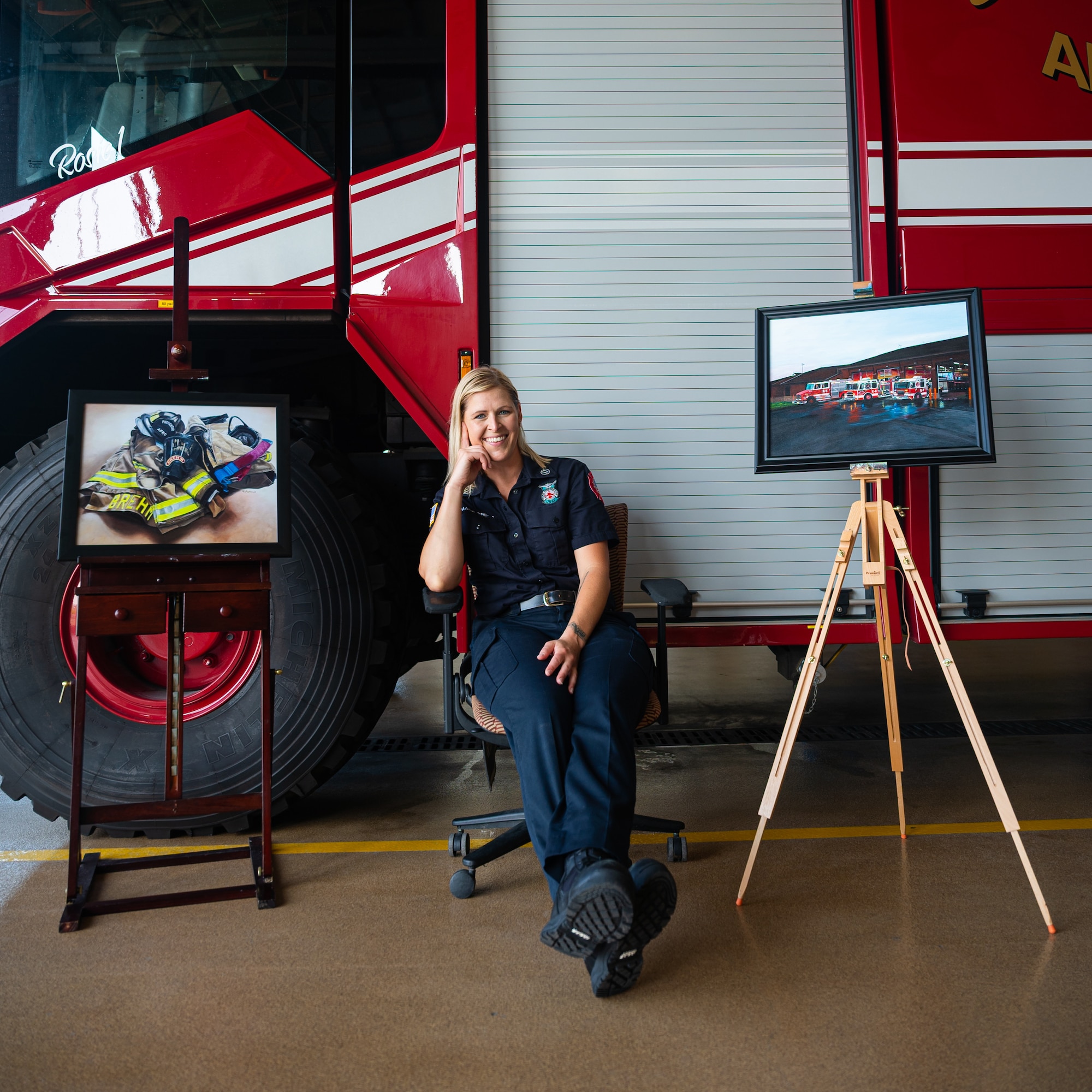 Capt. Marie Brehm, a crew chief at the Niagara Falls Air Reserve Station Fire Department, poses for a creative portrait at the fire hall on Niagara Falls Air Reserve Station, New York, July 28, 2023.