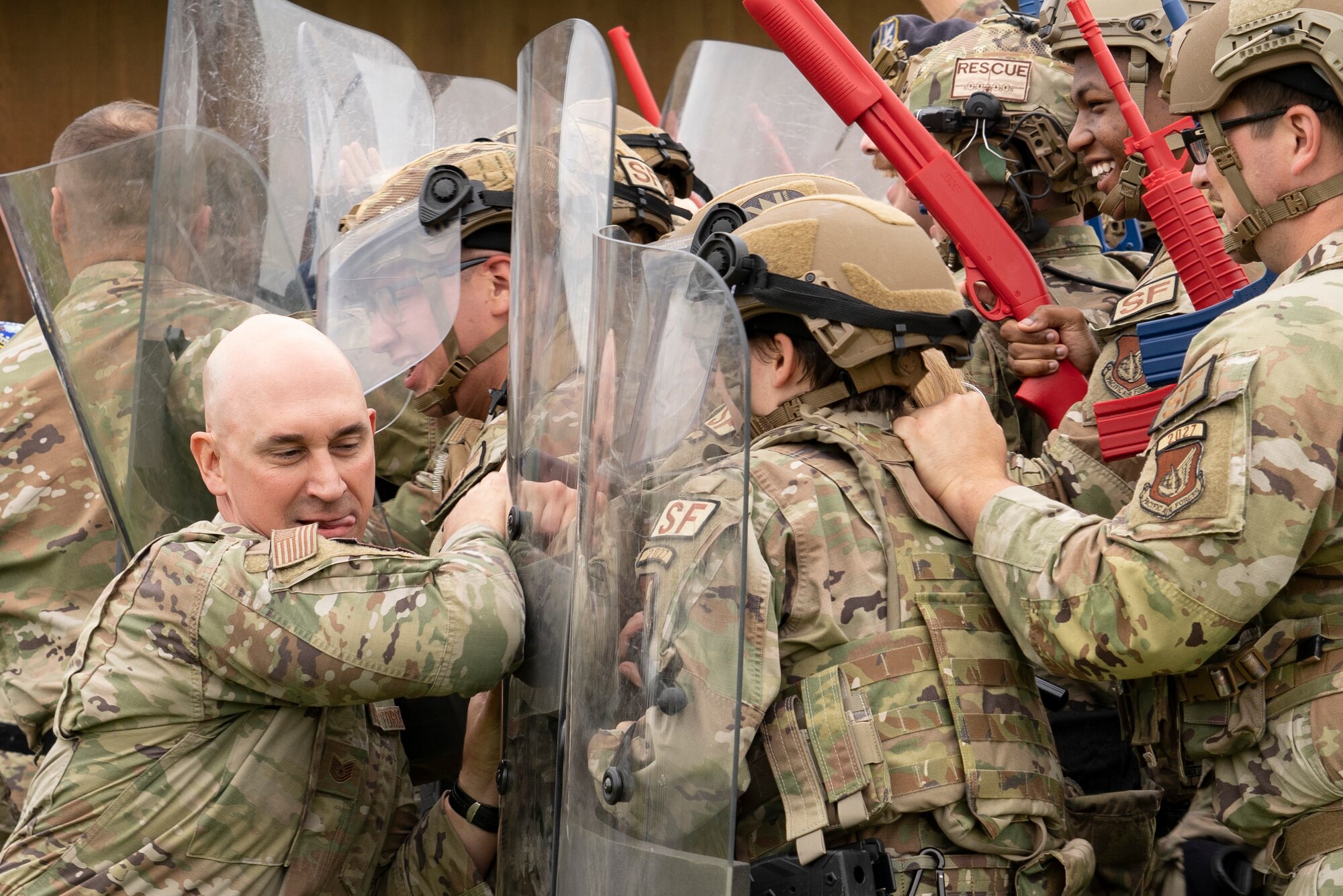 Security Forces Airmen participate in riot-control training.
