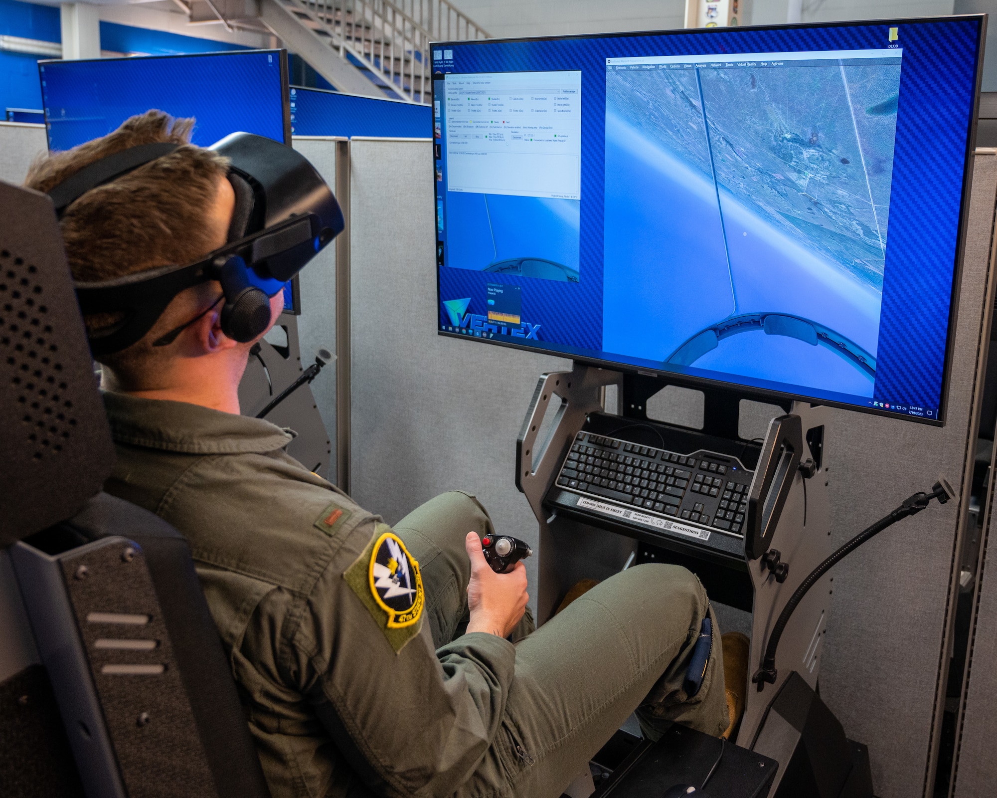 U.S. Air Force 2nd Lt. Christian Lobiondo, 47th Student Squadron student pilot, takes off in a T-6 Texan II in virtual reality at Laughlin Air Force Base, Texas, July 20, 2023. VR units have been installed into classrooms at Laughlin, allowing students to rapidly practice lessons taught earlier. (U.S. Air Force photo by Senior Airman Nicholas Larsen)