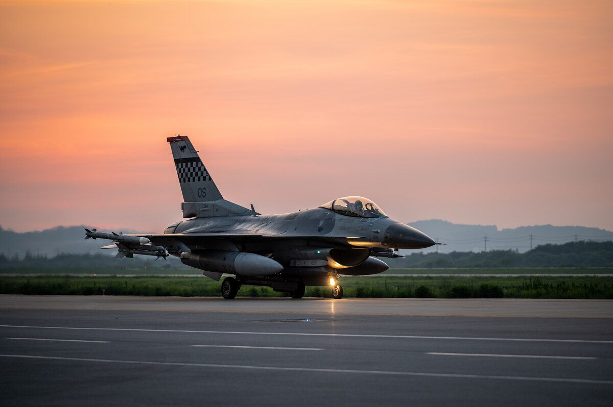 A U.S. Air Force F-16 Fighting Falcon assigned to the 51st Fighter Wing, taxis down an Alternate Landing Surface (ALS) at Osan AB, Republic of Korea, Aug. 1, 2023. With an ALS, the 51st FW maintains operational continuity, allowing jets to take off and land safely despite potential runway issues. (U.S. Air Force photo by Staff Sgt. Thomas Sjoberg)