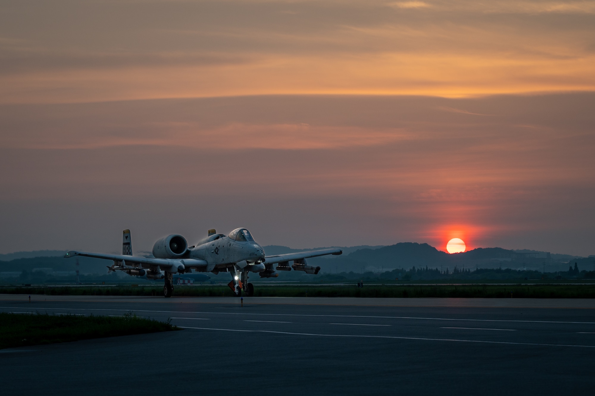 A U.S. Air Force A-10C Thunderbolt II assigned to the 51st Fighter Wing, takes off using an Alternate Landing Surface (ALS) at Osan AB, Republic of Korea, Aug. 1, 2023. The ALS is conducted during routine training events to guarantee the 51st FW's ability to deploy aircraft, regardless of main runway damage. (U.S. Air Force photo by Staff Sgt. Thomas Sjoberg)