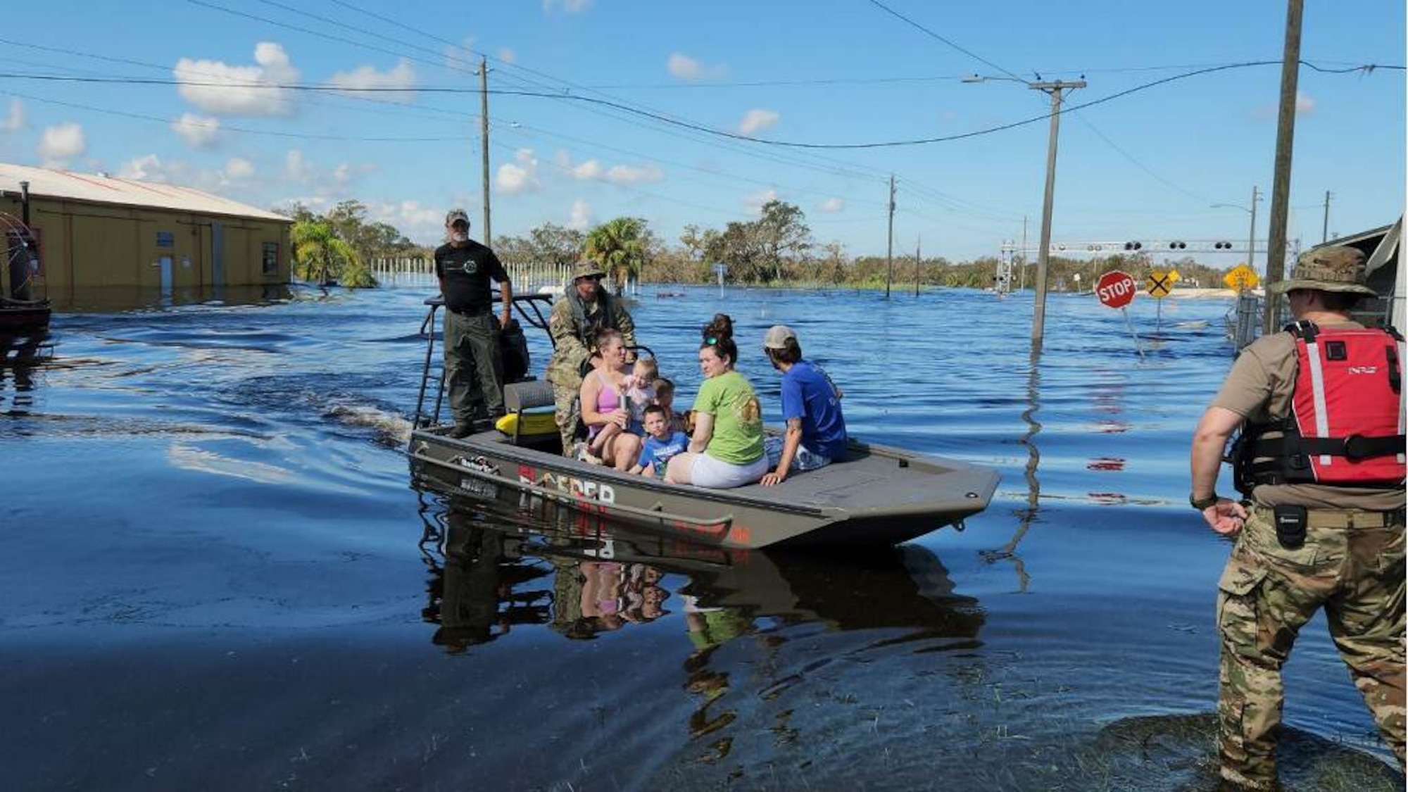 Military evacuates family by boat