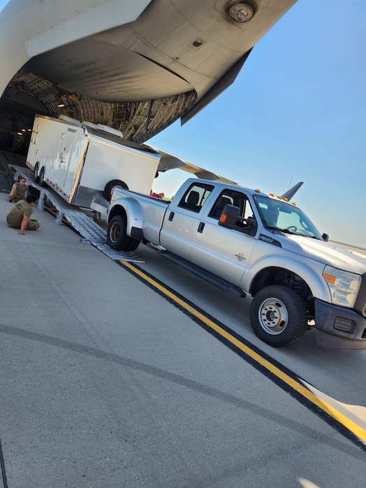  A Range Closed Loop Environment, or RCLE, is loaded onto a C-17 Globemaster III to validate its ability to be transported via military air in Colorado Springs, Colorado, July 18, 2023. Until recently, units seeking the best practice venues on the nation's space range had to be connected by road to Colorado Springs. Now, every main range component can be deployed via aerial transport, expanding operational capacities significantly. (Courtesy photo)