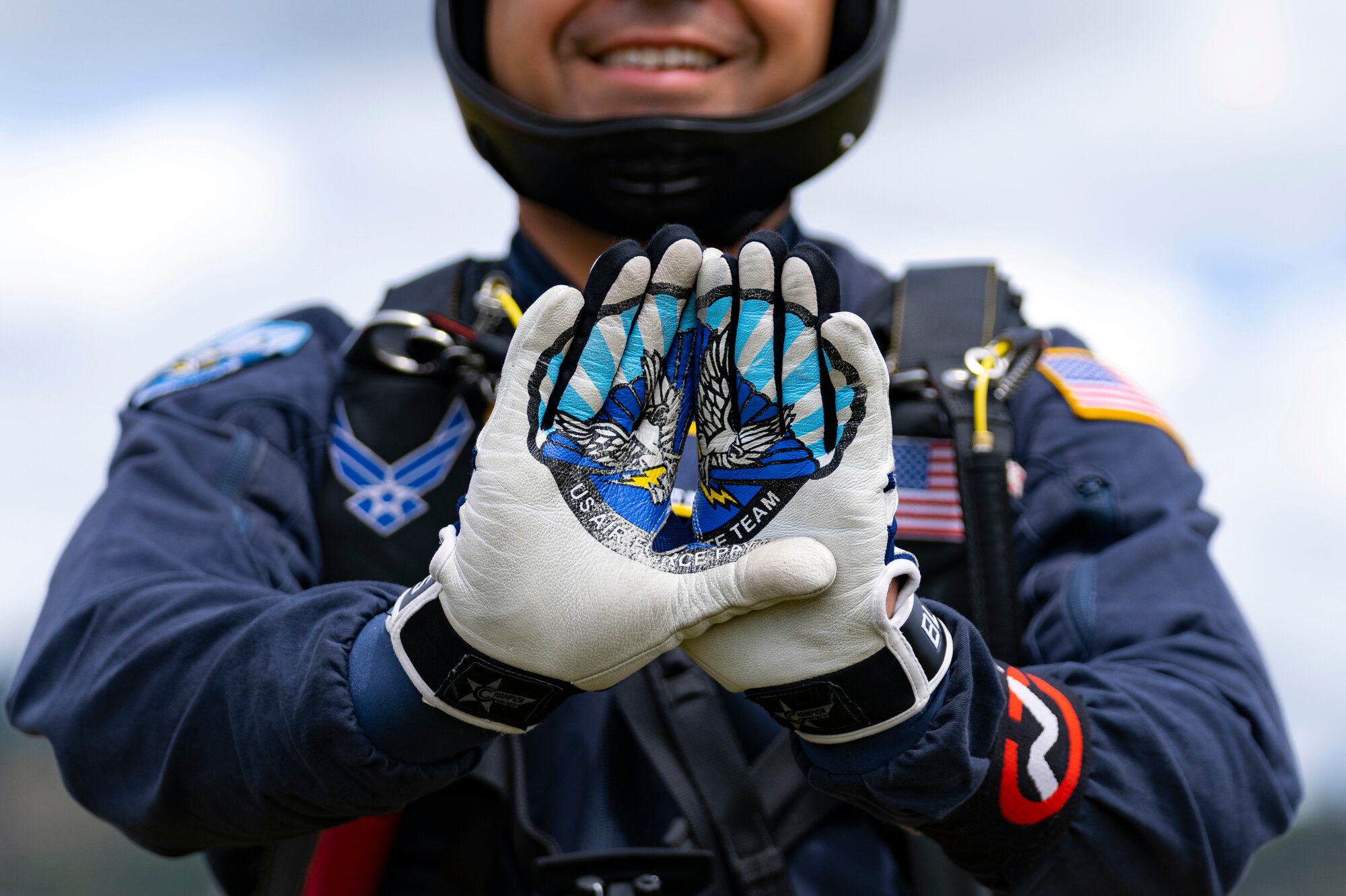 Master Sgt. Miguel Sarria, jumpmaster assigned to U.S. Air Force Academy Wings of Blue, completes a precision parachuting demonstration during F-AIR Colombia International Aeronautics and Space Fair at the José María Córdova Airport in Rionegro, Colombia, July 16, 2023. Participating in events such as airshows reflect an enduring promise to regional partners for a cooperative, prosperous, and secure Western Hemisphere. U.S. Air Force photo by Tech. Sgt. Rachel Maxwell