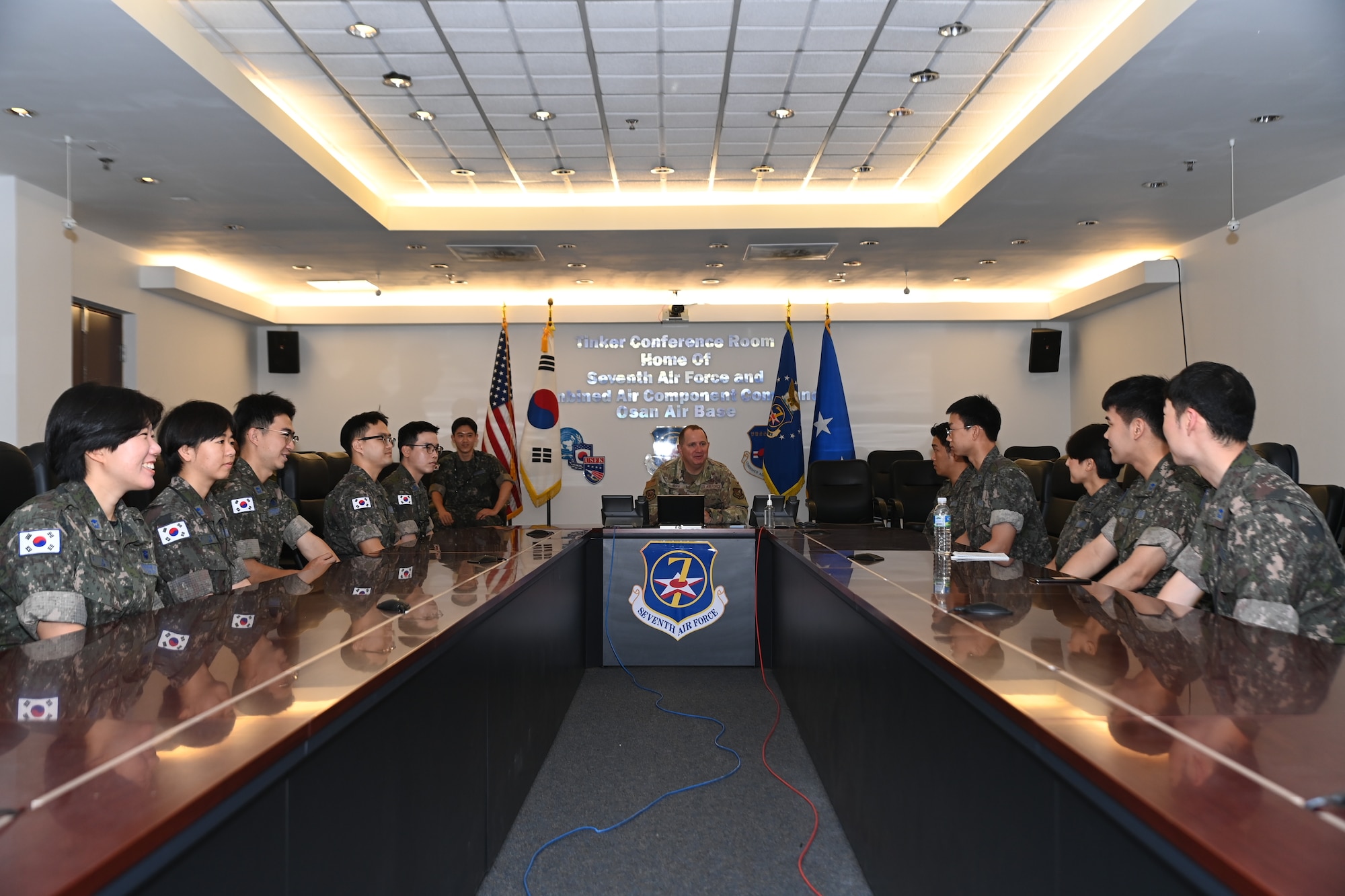 U.S. Air Force Col. Brady Vaira, 7th Air Force chief of staff, meets with Republic of Korea Air Force interpretation officers in training during an immersion tour at Osan Air Base, ROK, July 25, 2023.
