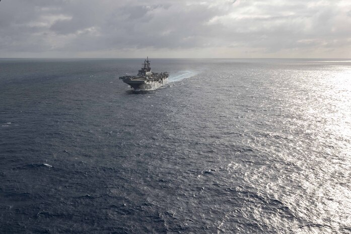 ATLANTIC OCEAN (July 20, 2023) Wasp-class amphibious assault ship USS Bataan (LHD 5) conducts routine operations in the Atlantic Ocean. USS Bataan, along with the San Antonio-class amphibious transport dock ship USS Mesa Verde (LPD 19) and the Harper’s Ferry class dock landing ship USS Carter Hall (LSD 50) are currently on a scheduled deployment to the U.S. 5th and U.S. 6th Fleet areas of responsibility. The U.S. Navy and U.S. Marine Corps routinely participate in scheduled deployments to improve combined combat readiness, increase operational capacity, and strengthen relationships among allies and partners throughout the region. (U.S. Navy photo by Mass Communication Specialist 2nd Class Danilo Reynoso)