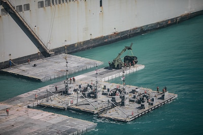 Landing pads and equipment beside a ship