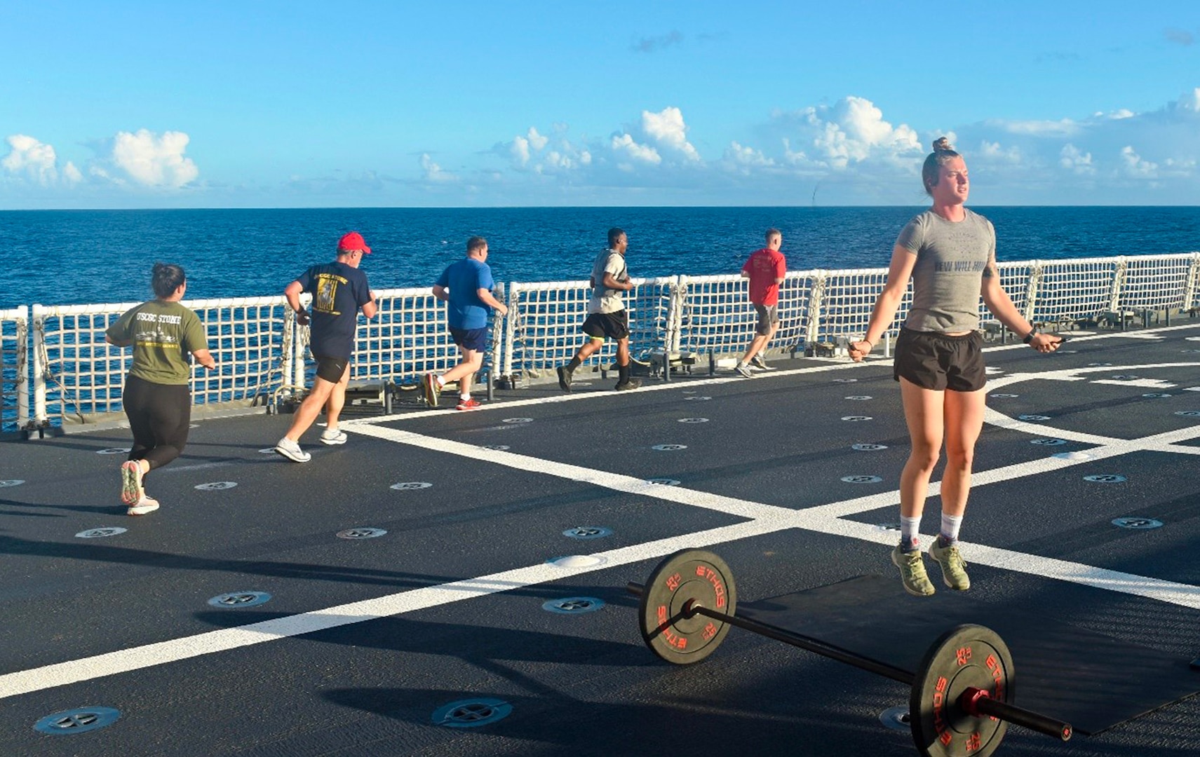 Members of the USCGC Stone (WMSL 758) conduct a regular workout while at sea in the South Atlantic on Jan. 19, 2021. Maintaining physical fitness is key to performing operations safely. (U.S. Coast Guard photo by Petty Officer 3rd Class John Hightower)