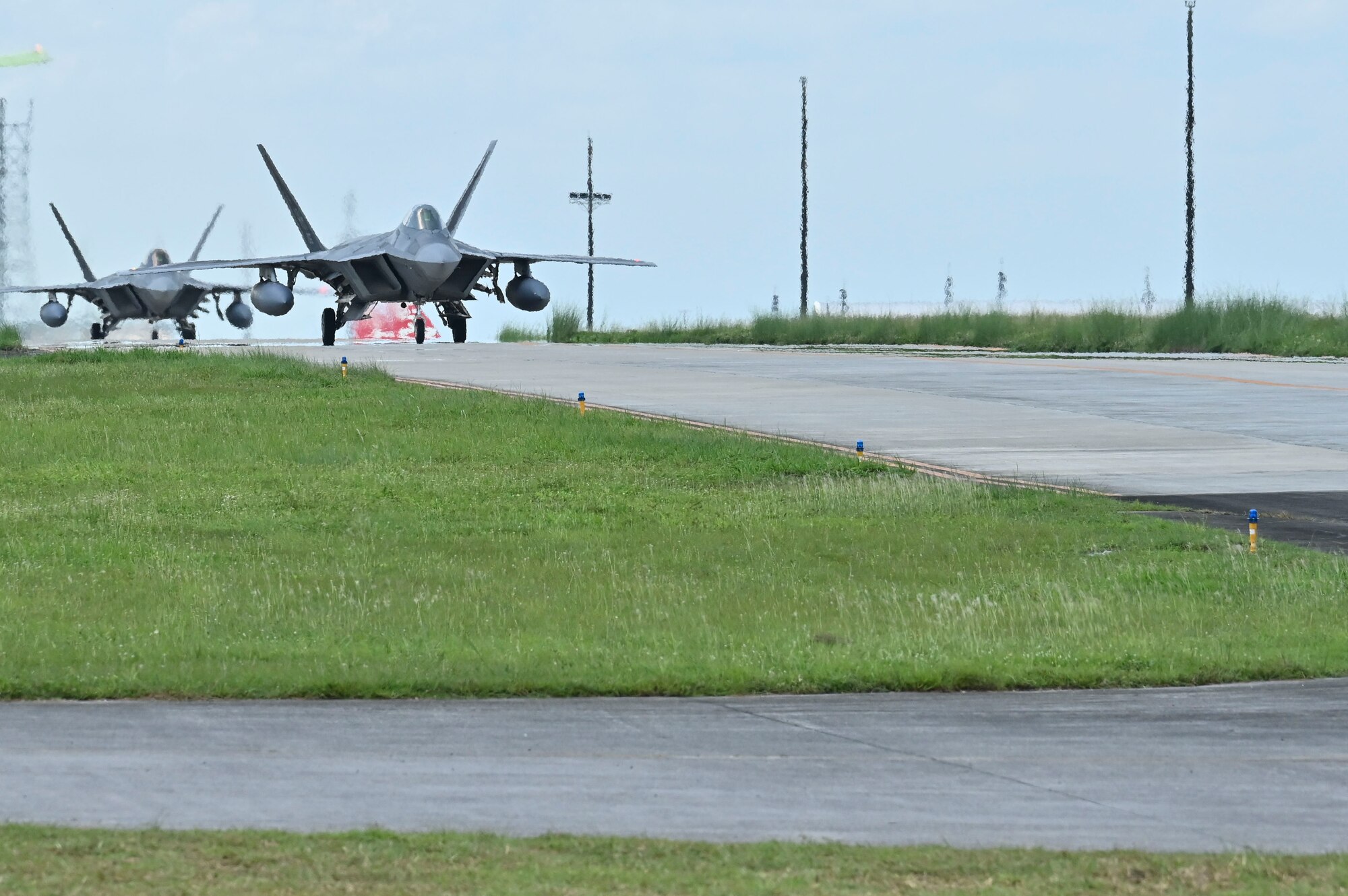 Two U.S. Air Force HC-130J Combat King IIs are being displayed on the flight line during exercise Cope Thunder 23-2 at Clark Air Base, Philippines, July 10, 2023.  Training alongside our Philippine Air Force counterparts allows us to demonstrate a shared vision of maintaining security, stability, prosperity, and peace throughout the Indo-Pacific. (U.S. Air Force photo by Senior Airman William Turnbull)