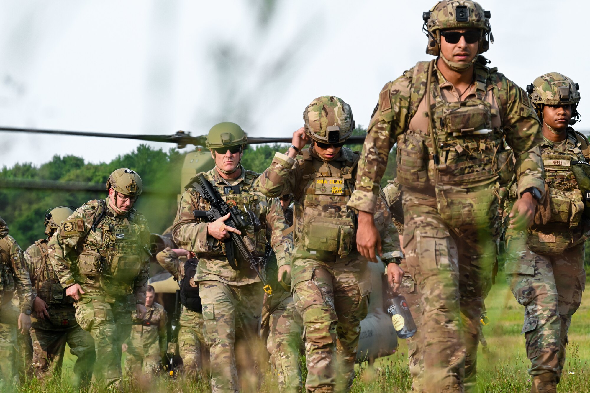 Air Force Reserve Command Security Forces Defenders disembark an Ohio National Guard CH-47 Chinook helicopter on July 25, 2023, at Camp James A. Garfield Joint Military Training Center, Ohio.