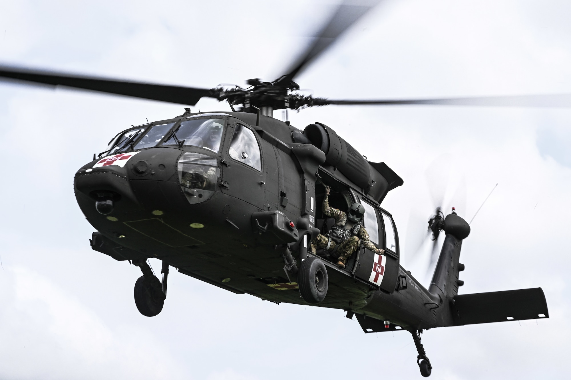A 3rd Batallion, 238th Air Regiment UH-60 Blackhawk helicopter flies over Camp James A. Garfield Joint Military Training Center, Ohio.