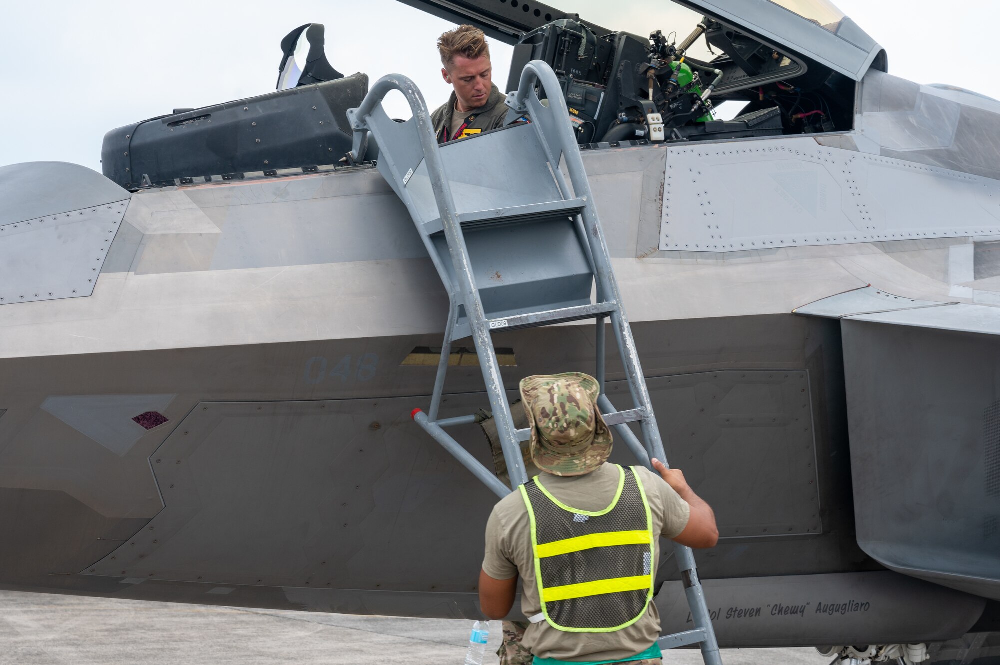 A U.S. Air Force Airman assists the pilot of an F-22 Raptor in deplaning during Cope Thunder 23-2 at Clark Air Base, Philippines, July 7, 2023. Bilateral training exercises like Cope Thunder 23-2 helped to reinforce the U.S.’ commitment to peace and prosperity in the region.