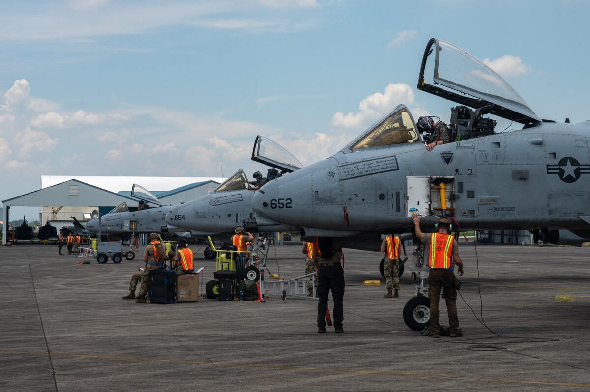 U.S. Air Force Airmen, assigned to Davis-Monthan Air Force Base, Arizona perform preflight maintenance on A-10C Thunderbolt IIs during Cope Thunder 23-2 at Clark Air Base, Philippines, July 7, 2023. Cope Thunder 23-2 was an exercise that built relationships that bridged the language barrier and enhanced the U.S. and the Philippines’ collective ability to address the most pressing security challenges.