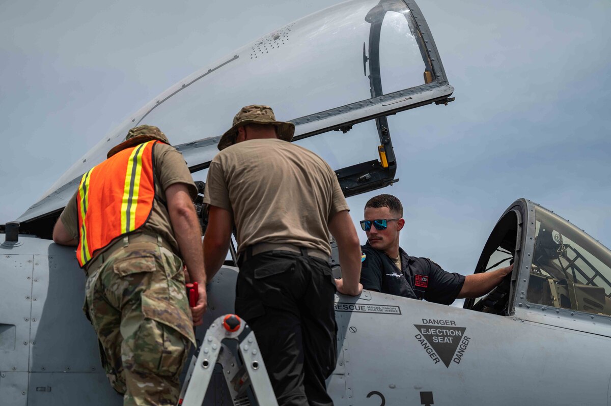 U.S. Air Force Airmen perform maintenance on an A-10C Thunderbolt II during exercise Cope Thunder 23-2 on the South ramp of Clark Air Base, Philippines, July 9, 2023. Cope Thunder gives us an opportunity to exercise combined fighter operations and enable tactical units to operate together. (U.S. Air Force photo by Airman 1st Class Jhade Herrera)