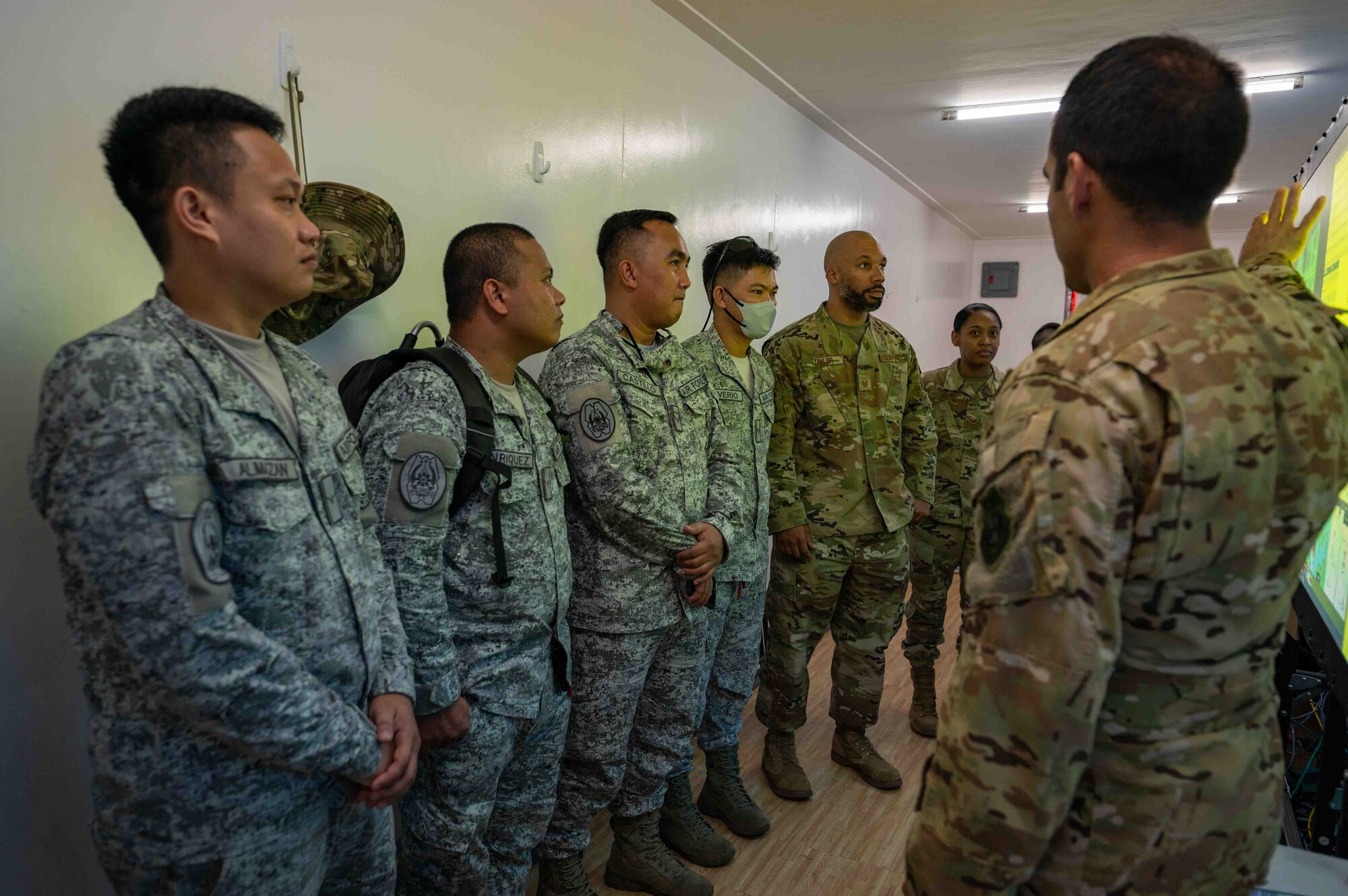 U.S. Air Force personnel brief Philippine Air Force personnel during exercise Cope Thunder 23-2 on the South ramp of Clark Air Base, Philippines, July 11, 2023. Through bilateral training, the U.S. and Philippine Air Forces work together to promote interoperability, thus furthering our investments and strengthening our relationships.
(U.S. Air Force photo by Airman 1st Class Jhade Herrera)