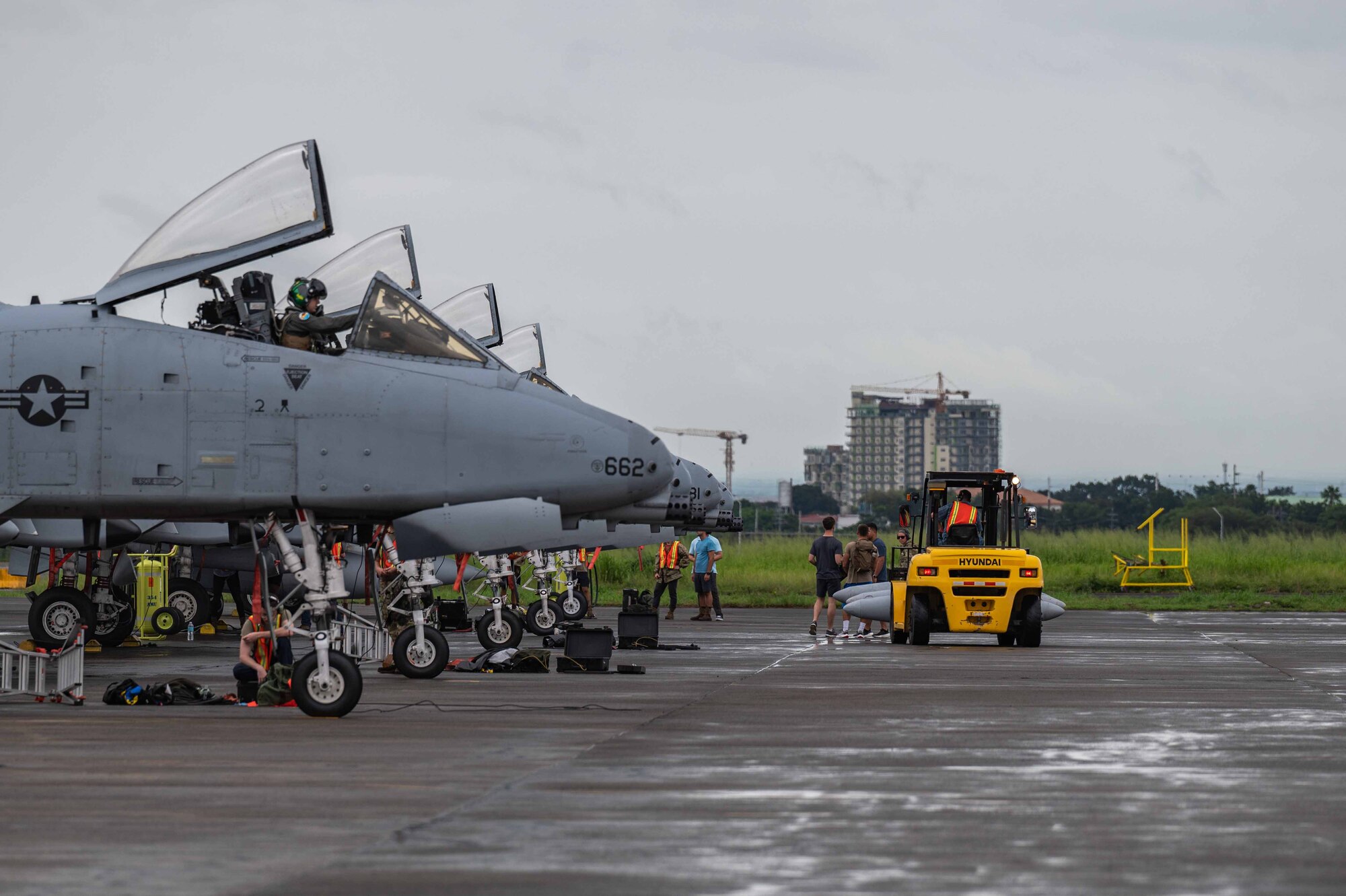 U.S. Air Force maintainers and transportation function technicians transport cargo during exercise Cope Thunder 23-2 on the South ramp of Clark Air Base, Philippines, July 16, 2023. Cope Thunder 23-2 demonstrated the U.S.’ resolve in promoting regional security and cooperation. (U.S. Air Force photo by Airman 1st Class Jhade Herrera)