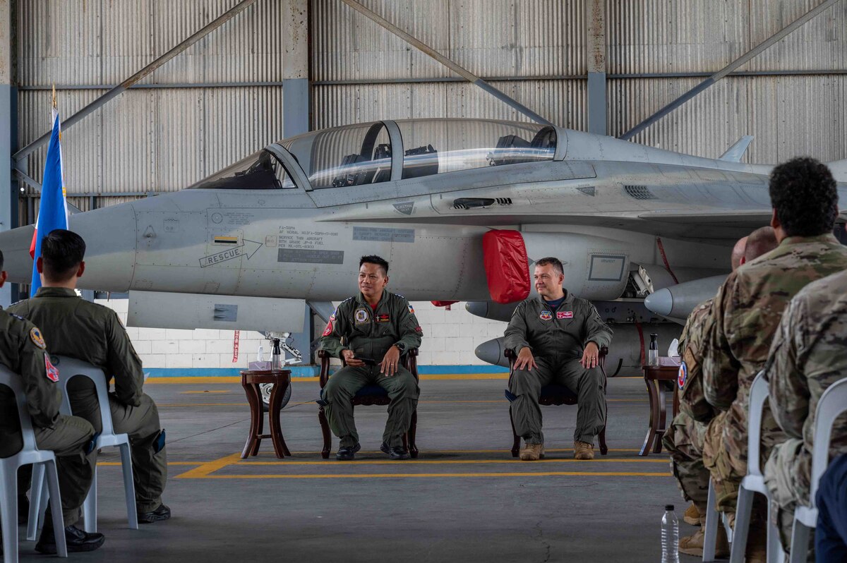 U.S. and Philippine Air Force personnel participate in the closing ceremony of exercise Cope Thunder 23-2 on the South ramp of Clark Air Base, Philippines, July 21, 2023. The objectives of the exercise are to plan for combined fighter operations; practice interoperability with tactical units; and bolster the combat capability of participating nations. (U.S. Air Force photo by Airman 1st Class Jhade Herrera)