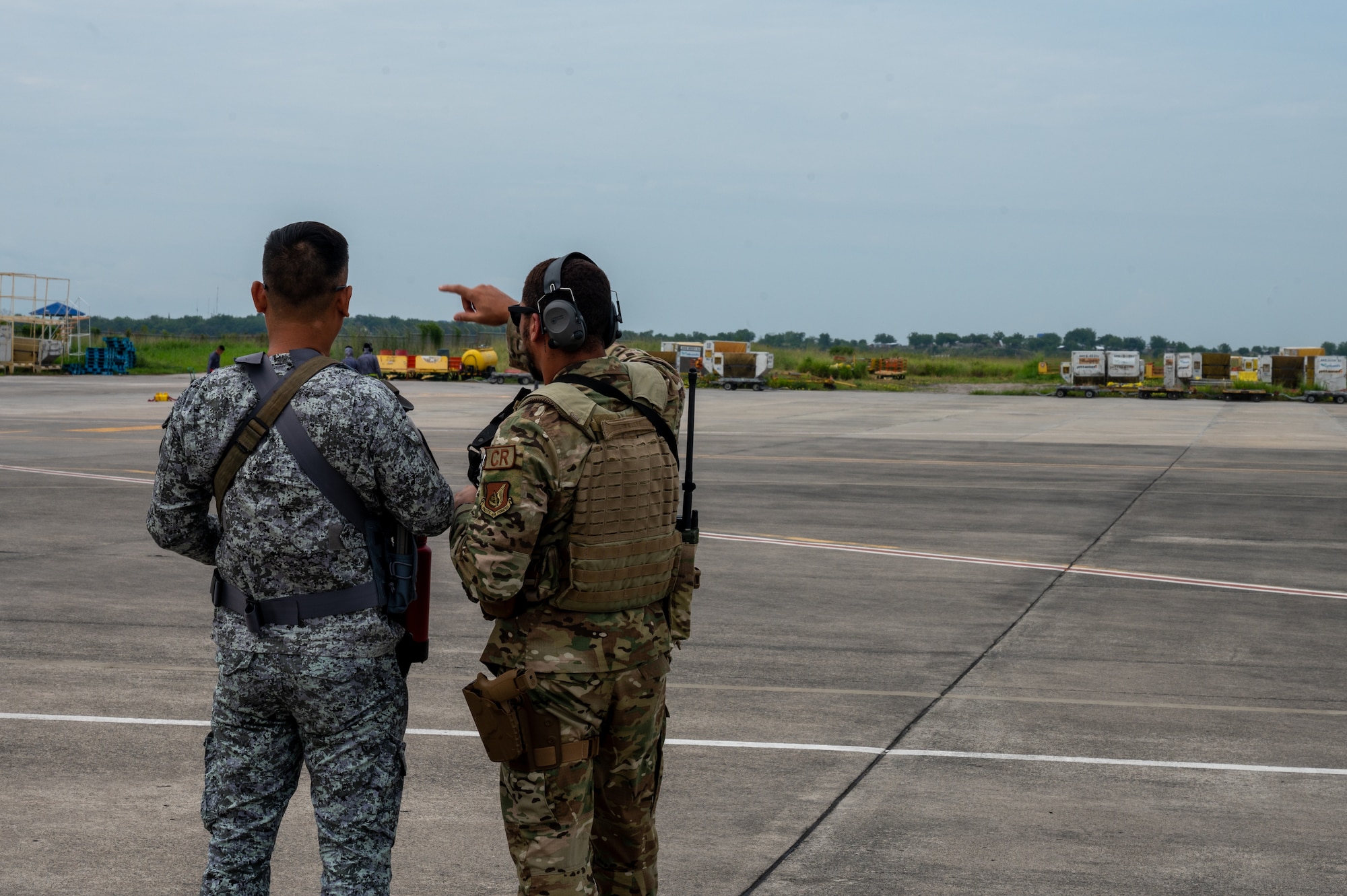 A U.S. Air Force Airman, assigned to Davis-Monthan Air Force Base, Arizona, along with a Philippine Air Force member provide security in support of Cope Thunder 23-2 at General Santos International Airport, Philippines, July 11, 2023. Cope Thunder 23-2 provided a unique opportunity for the service members to train together, increasing the U.S.’ and the Philippines’ ability to work together.