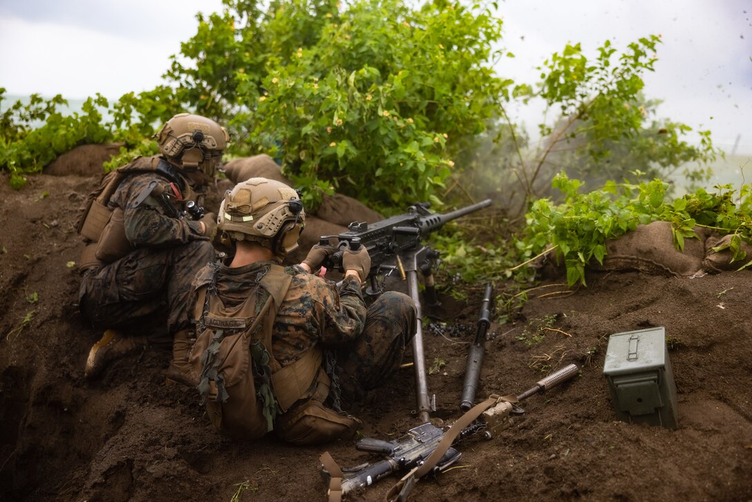 U.S. Marine Corps Pfc. Justin O’Neal, a team leader and Lance Cpl. Ignacio Aguinaga, a machine gunner with 2nd Battalion, 5th Marine Regiment, 1st Marine Division, fire a M2A1 .50-caliber machine gun during a littoral live fire exercise for Marine Aviation Support Activity 23 at Punta Baja, Palawan, Philippines, July 15, 2023. MASA 23 is a bilateral exercise between the Armed Forces of the Philippines and the U.S. Marine Corps, aimed at enhancing interoperability and coordination in support of U.S.-Philippine mutual defense. O’Neal is a Beaumont, Texas native. Aguinaga is a Ennis, Texas native.
