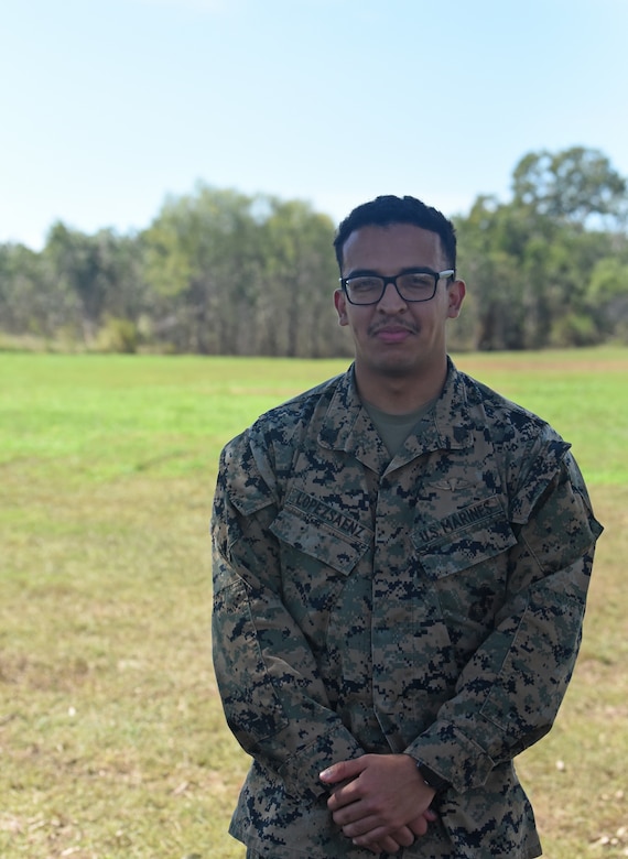 A Marine poses for a photo.