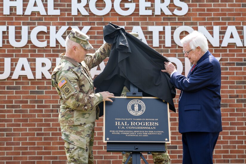 Kentucky Adjutant General Maj. Gen. Hal Lamberton and U.S. Congressman Hal Rogers unveil a plaque during a ceremony in Monticello, Kentucky, July 24, 2023.