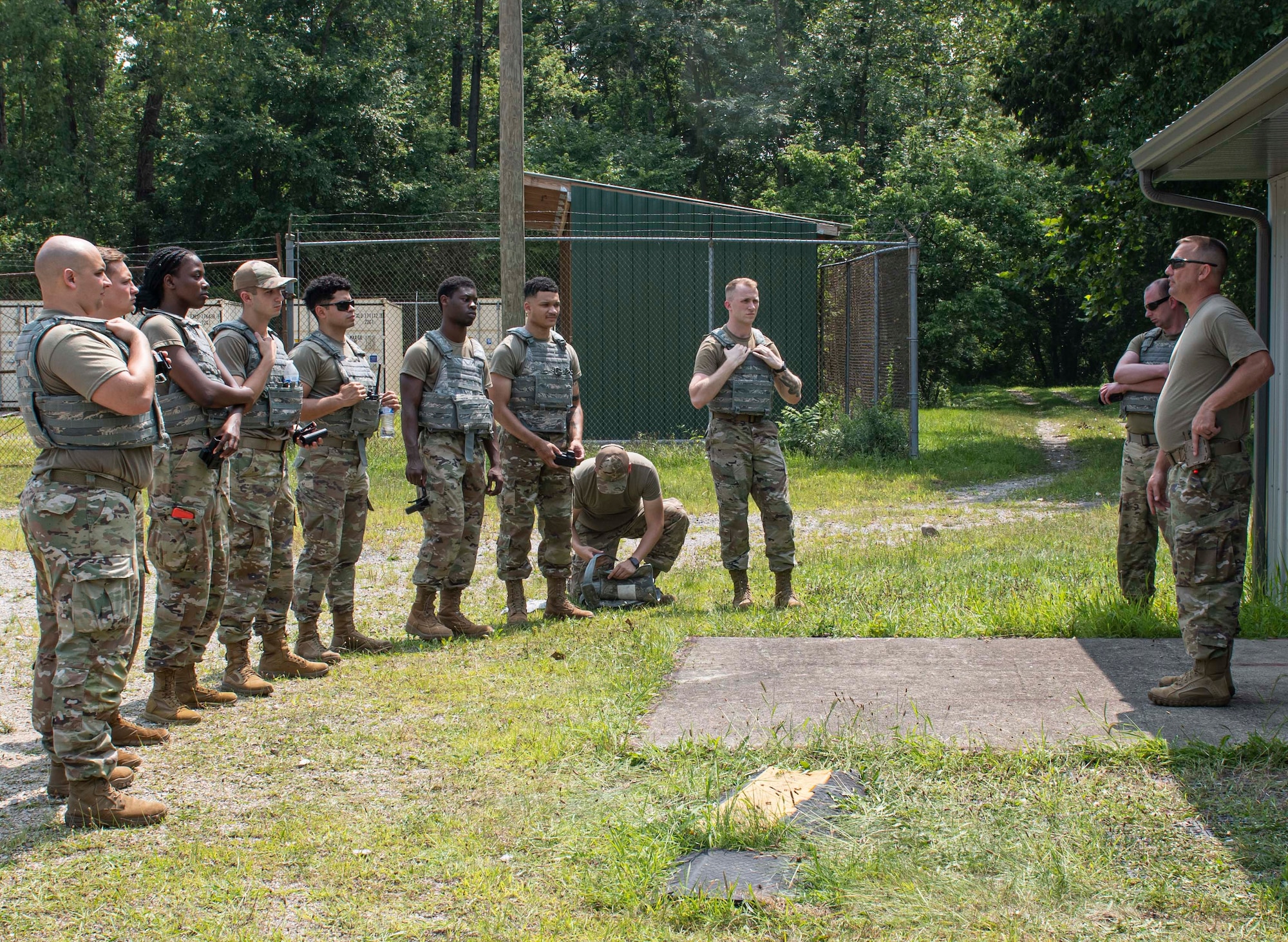 Master Sgt. Christopher Hill, the 88th Communications Squadron’s Information Assurance Section chief, gives instructions about the clearing-barrel procedure to Airmen during a training event Aug. 2, 2023, at Wright-Patterson Air Force Base, Ohio.