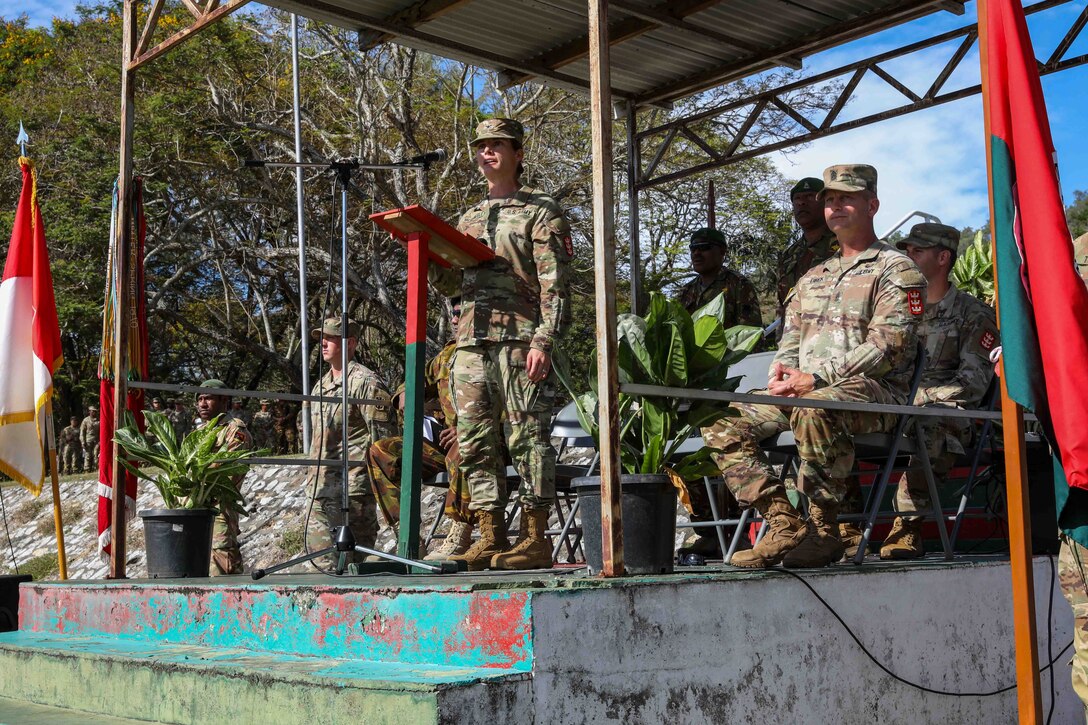 Commander, 130th Engineer Brigade, 8th Theater Sustainment Command, Col. Margaret McGunegle, addresses U.S. and PNGDF Soldiers during the opening ceremony of Exercise Tamiok Strike 2023, Taurama Barracks, Port Moresby, Papua New Guinea July 31, 2023. Tamiok Strike 2023 is a two-week bilateral training exercise aimed at improving the combined interoperability of the Papua New Guinea Defense Forces and U.S. Forces, to increase partner capacity for conventional, complex and future contingencies throughout the Indo-Pacific region. This is the third iteration of Tamiok Strike.