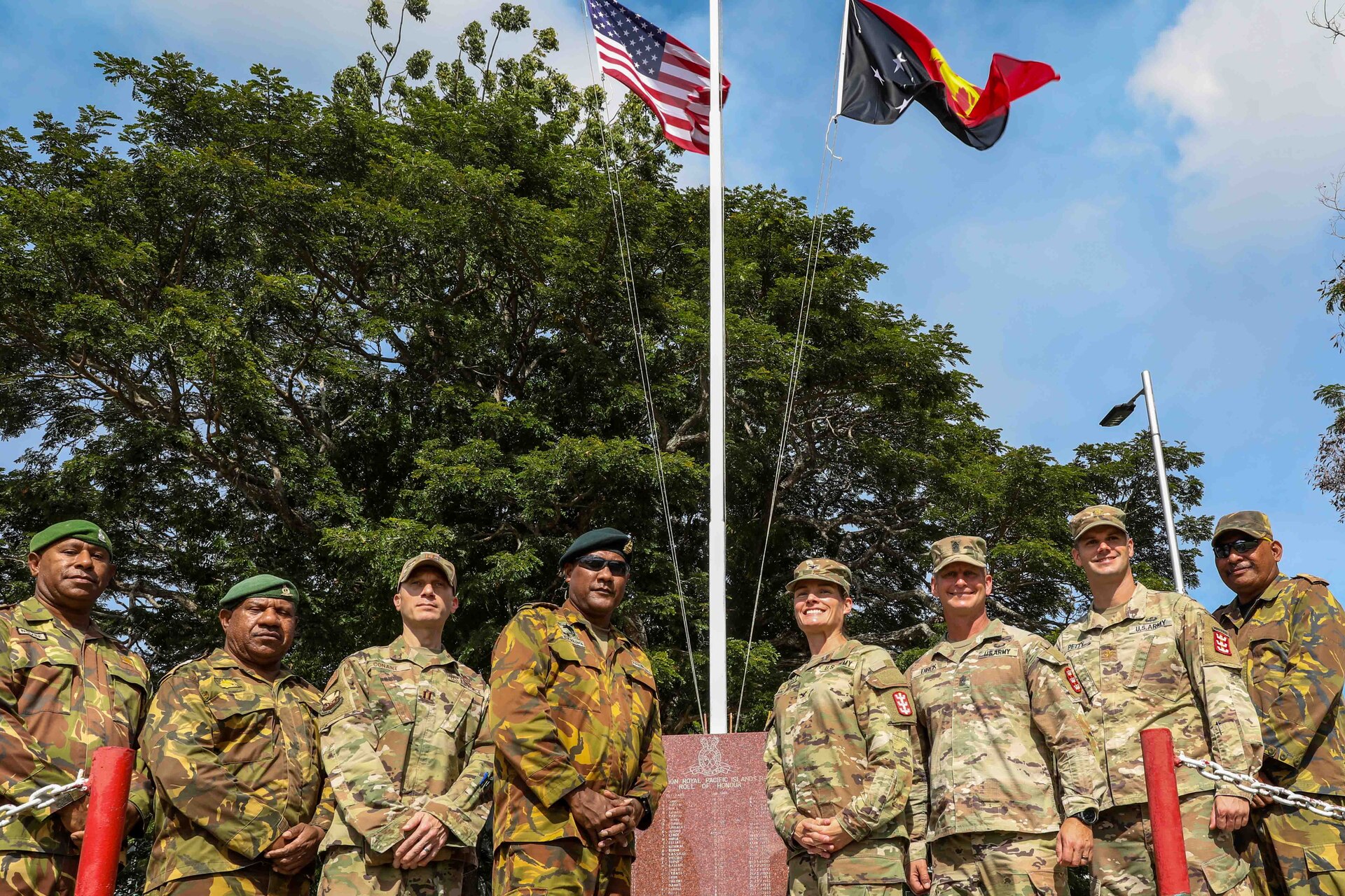 Command leadership for 130th Engineer Brigade, 8th Theater Sustainment Command and Papua New Guinea Dence Force 1st Regimental Pacific Infantry Regiment pose for a phot following the opening ceremony of Exercise Tamiok Strike 2023, Taurama Barracks, Port Moresby, Papua New Guinea July 31, 2023. Tamiok Strike 2023 is a two-week bilateral training exercise aimed at improving the combined interoperability of the Papua New Guinea Defense Forces and U.S. Forces, to increase partner capacity for conventional, complex and future contingencies throughout the Indo-Pacific region. This is the third iteration of Tamiok Strike.