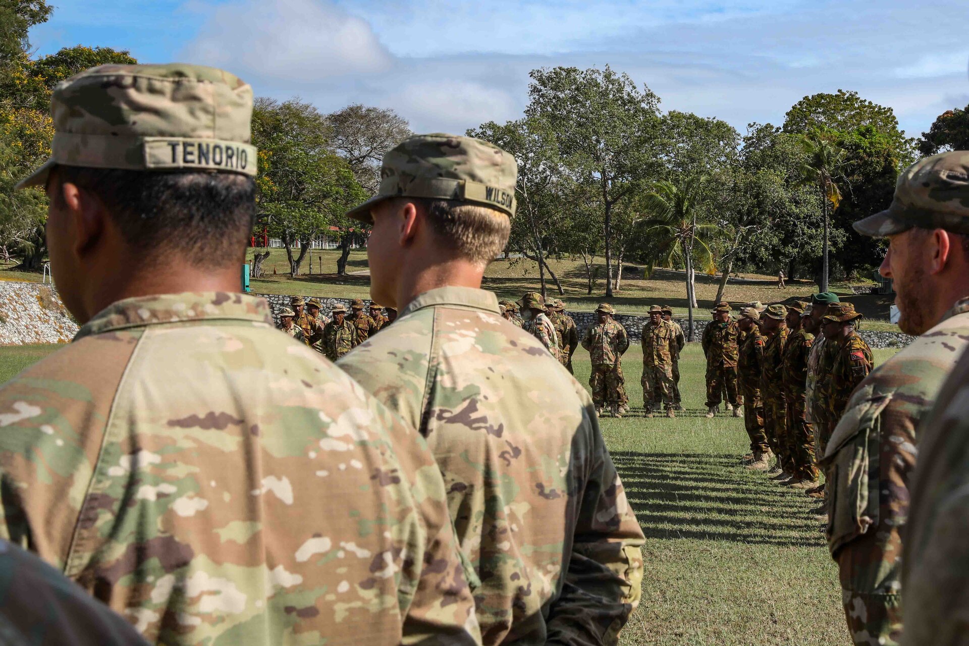 U.S. Army and Papua New Guinea Dence Force Soldiers stand in formation during the opening ceremony of Exercise Tamiok Strike 2023, Taurama Barracks, Port Moresby, Papua New Guinea July 31, 2023. Tamiok Strike 2023 is a two-week bilateral training exercise aimed at improving the combined interoperability of the Papua New Guinea Defense Forces and U.S. Forces, to increase partner capacity for conventional, complex and future contingencies throughout the Indo-Pacific region. This is the third iteration of Tamiok Strike.