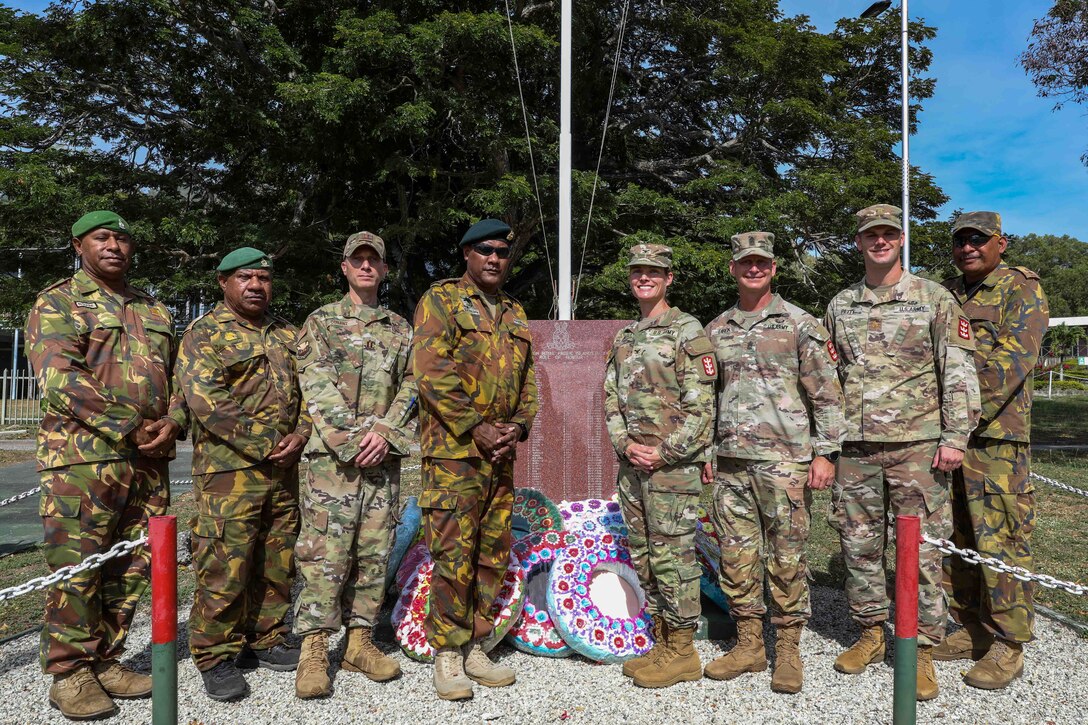 Command leadership for 130th Engineer Brigade, 8th Theater Sustainment Command and Papua New Guinea Dence Force 1st Regimental Pacific Infantry Regiment pose for a phot following the opening ceremony of Exercise Tamiok Strike 2023, Taurama Barracks, Port Moresby, Papua New Guinea July 31, 2023. Tamiok Strike 2023 is a two-week bilateral training exercise aimed at improving the combined interoperability of the Papua New Guinea Defense Forces and U.S. Forces, to increase partner capacity for conventional, complex and future contingencies throughout the Indo-Pacific region. This is the third iteration of Tamiok Strike.