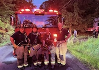 Photo of Tobyhanna firefighters posing after responding to a mutual aid call in the community.