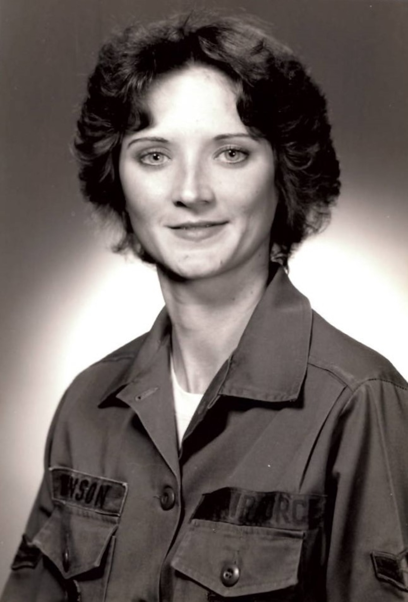 U.S. Air Force Col. David Morales, 62d Airlift Wing deputy commander, presents Pamela Best, electronic mechanic with the 62d Maintenance Squadron, with a certificate of service at Joint Base Lewis-McChord, Washington, July 26, 2023. Best joined the Air Force in 1983 as an avionic inertial RADAR navigation specialist. This month she celebrates 40 years of combined duty and civilian service with the Air Force. (U.S. Air Force photo by Airman 1st Class Kylee Tyus)