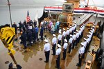 Coast Guard Cutter Cypress personnel stand at attention during a change-of-command ceremony held at Base Kodiak in Kodiak, Alaska, Aug. 3, 2023. Base Kodiak is the largest land installation of the Coast Guard and serves as the senior Mission Support touchstone for Coast Guard operations within the 17th District across Alaska, standing shoulder-to-shoulder with its operational partners to ensure the delivery of professional, responsive and cost-effective services to the American public. U.S. Coast Guard photo by Petty Officer 3rd Class Ian Gray.