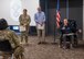 Chief Master Sergeant of the Air Force #5 (ret.) Robert Gaylor presents Chief Master Sgt. Kristy Earls, 59th Medical Wing command chief (left), and Cody Kirksey, 59th MDW protocol chief (middle), with a memo he wrote, Bob Gaylor’s 25 Words, at Wilford Hall Ambulatory Surgical Center, Joint Base San Antonio-Lackland, Texas, Aug. 2, 2023. Gaylor became Chief Master Sergeant of the Air Force on Aug. 1, 1977 and retired July 31, 1979. (U.S. Air Force photo by Senior Airman Melody Bordeaux)