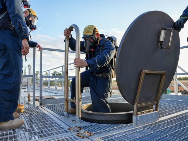 Members of the Joint Task Force-Red Hill (JTF-RH) roving security and fire watch personnel conduct low light and low visibility training on Joint Base Pearl Harbor-Hickam, Honolulu, Hawaii, August 1, 2023.