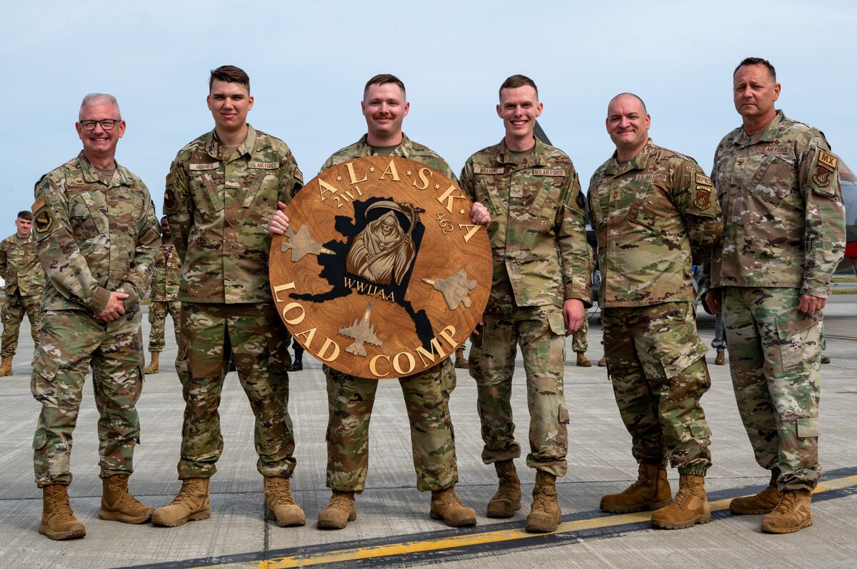 Award presented to weapons load crew assigned to 356th FGS, Eielson AFB, at JBER, July 28, 2023