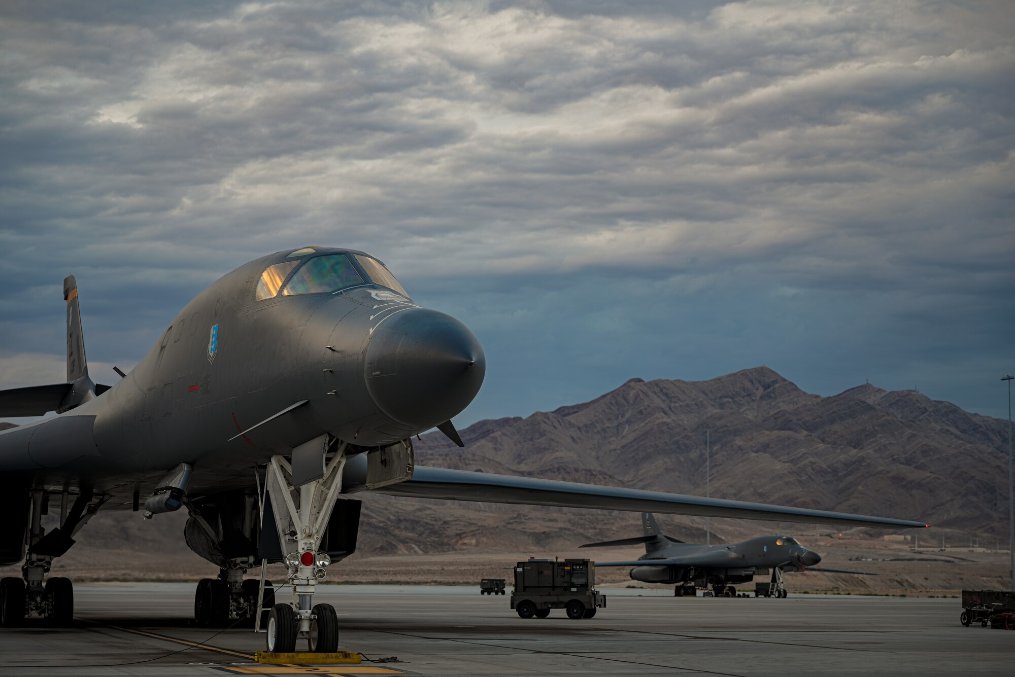 B-1B Lancer aircraft assigned the 34th Bomb Squadron, Ellsworth Air Force Base, South Dakota, are readied to participate in Red Flag-Nellis 23-3 at Nellis AFB, Nev. Aug. 1, 2023.