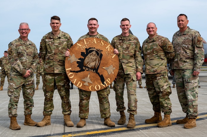 Award presented to weapons load crew assigned to 356th FGS, Eielson AFB, at JBER, July 28, 2023