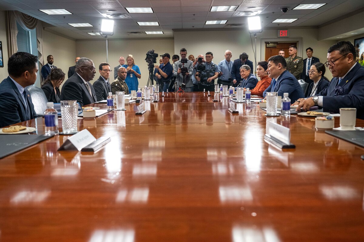 People sit at a large table.
