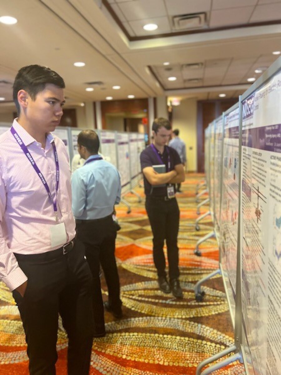 National Defense Science and Engineering Graduate Fellowship, or NDSEG, fellows review their classmates’ posters in different disciplines at the poster exhibit hall Aug. 1, 2023, at the Hilton Palacio del Rio in San Antonio, Texas. The NDSEG class of 2023 fellows displayed their research findings for DOD evaluators, peers and mentors in the science and technology community. (U.S. Air Force photo / Brianna Hodges)