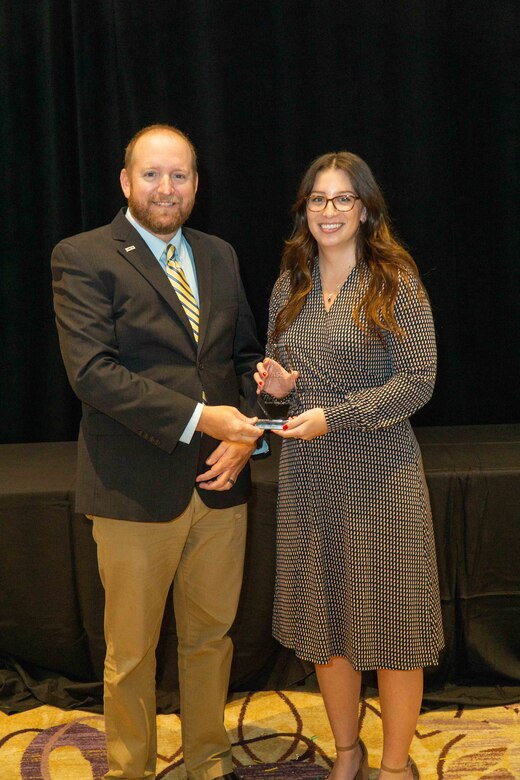 Nicole Bohaczyk receives the 2023 Government Engineer of the Year Award at the ASCE annual conference in Orlando, Fla.  (Photo credits to Bruce Layfield Photography)