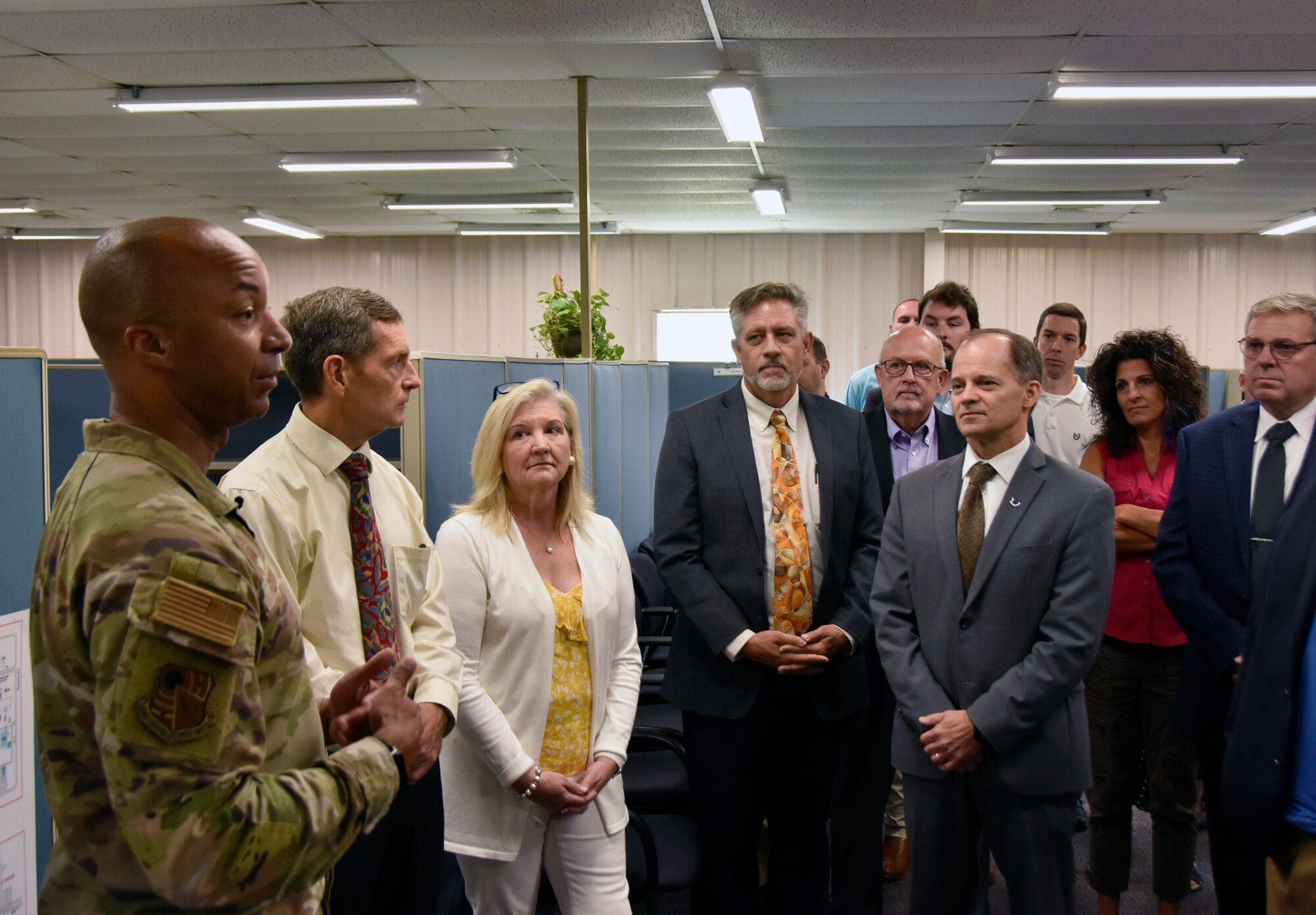 Col. Randel Gordon, Arnold Engineering Development Complex commander, left, speaks with AEDC leadership and Program Management Office personnel July 13, 2023, following a ribbon cutting for the Acquisition Branch office at Arnold Air Force Base, Tenn. The Acquisition Branch, part of the Program Management Office, will be tasked with leading the revitalization, development, delivery and installation of programs within the ground test capabilities across AEDC, and ensuring key program milestones are met within cost, schedule and performance requirements while adhering to quality, safety and technical standards to meet the demands of the National Defense Strategy. The goal of the Acquisition Branch team is to increase test capabilities throughout AEDC to help the U.S. Air Force remain competitive with near-peer adversaries. (U.S. Air Force photo by Bradley Hicks)
