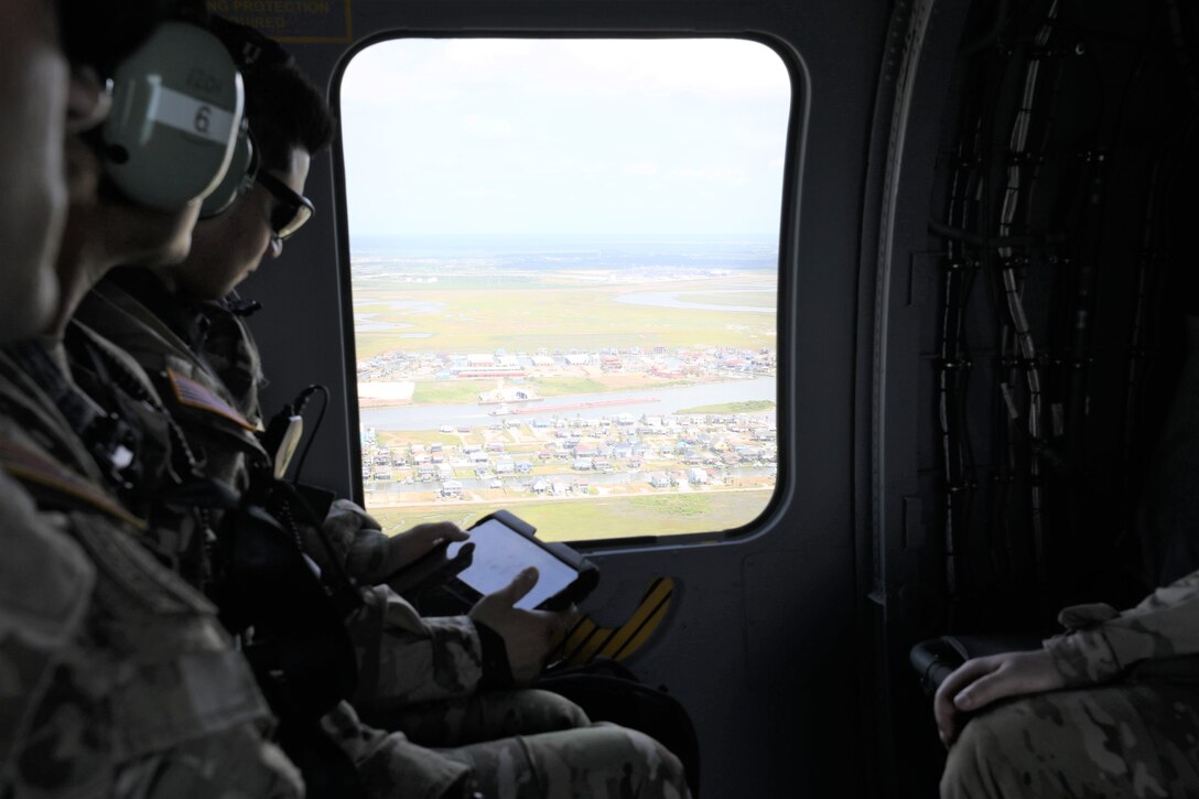 The flight took 20 district team members from the Jadwin Building, down the Texas coast to the Brazos River Floodgates, north to Addicks and Barker reservoirs, to the Conroe Army Reserve Center, the Wallisville Lake Project Office, and down the Houston Shipping Channel back to HQ.