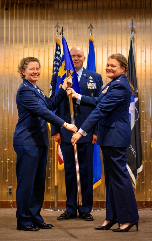 Col. Amy Bumgarner, OSI's commander, presides over the 8th Field Investigations Region change of command ceremony, where Col. Pamela A. Alley took the helm from Col. Seth A. Miller, the outbound commander. (Courtesy photo)