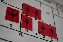 Aircraft icons on a whiteboard