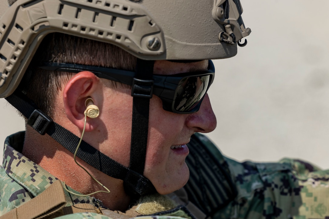 Midshipman 1st Class Samuel Murray, a Bay Village, Ohio, native and senior at the U.S. Naval Academy, fires a  Mark 19 40 mm grenade machine gun on a live-fire range with Marine Raiders from Marine Forces Special Operations Command on Camp Lejeune, North Carolina, July 26, 2023. While training with MARSOC, the midshipmen were able to experience the variety of tools and weapons employed by critical skills operators and special operations officers. (U.S. Marine Corps photo by Cpl. Henry Rodriguez)