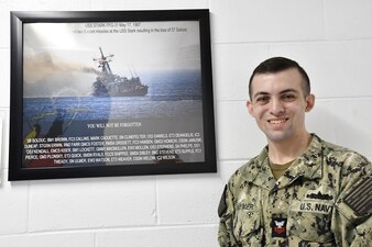Cryptologic Technician Technical 1st Class Brandon Raymer, an instructor at Information Warfare Training Command Corry Station, created a poster depicting attack on the USS Stark in 1987 by an Iraqi F-1 Mirage, which resulted in the loss of 37 Sailors. Raymer's emphasis behind creating the poster was to showcase the strength and Warrior Toughness mindset displayed by military personnel placed in impossible situation.