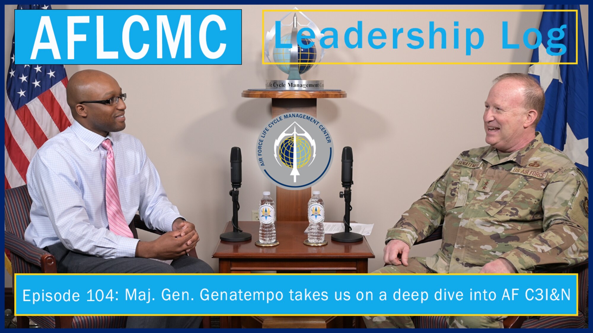 Photo of two individuals speaking for a podcast.