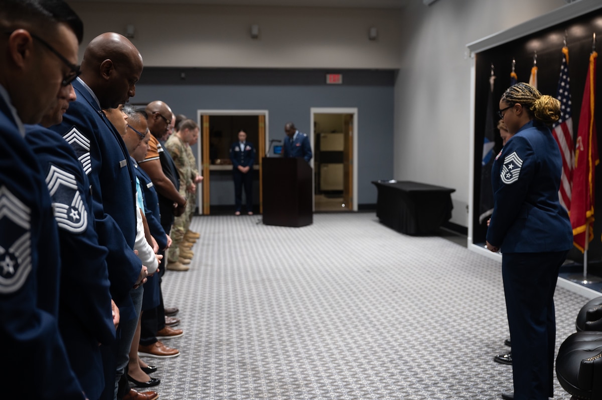 U.S. Air Force Capt. Kizito Okhuoya, 17th Training Wing chaplain, leads an invocation during the Assumption of Responsibility Ceremony at Goodfellow Air Force Base, Texas, July 24, 2023. Chief Master Sgt. Khamillia Washington assumed responsibility of the 17th Training Wing as command chief on July 19, 2023. Washington succeeds Chief Master Sgt. Rebecca Arbona, who served as the 17th Training Wing command chief from August 2021 to June 2023. (U.S. Air Force photo by Airman 1st Class Evelyn D'Errico)